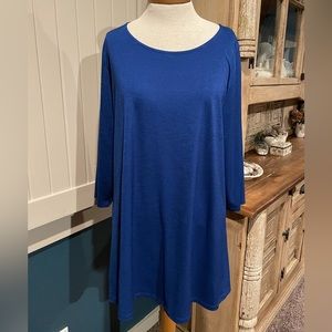 New without tags asymmetrical knit top, size XL